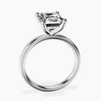 4.79 ct. emerald Four Prong Ring in platinum side right image one
