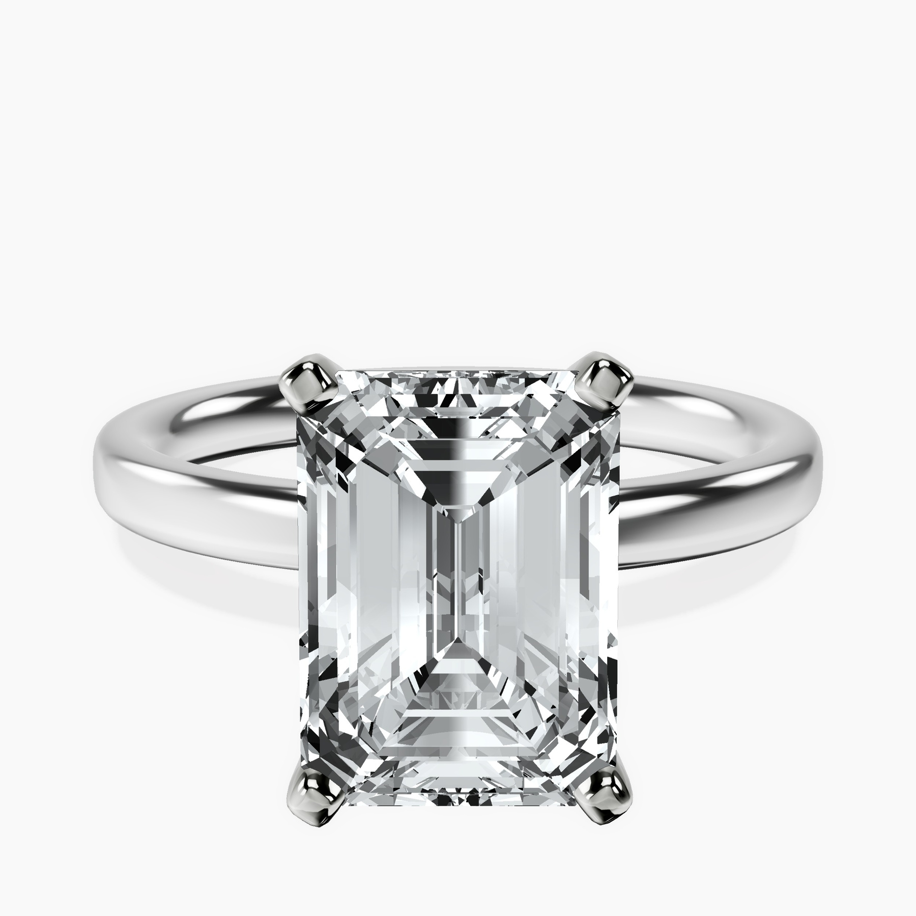 4.79 ct. emerald Four Prong Ring in platinum rtr top
