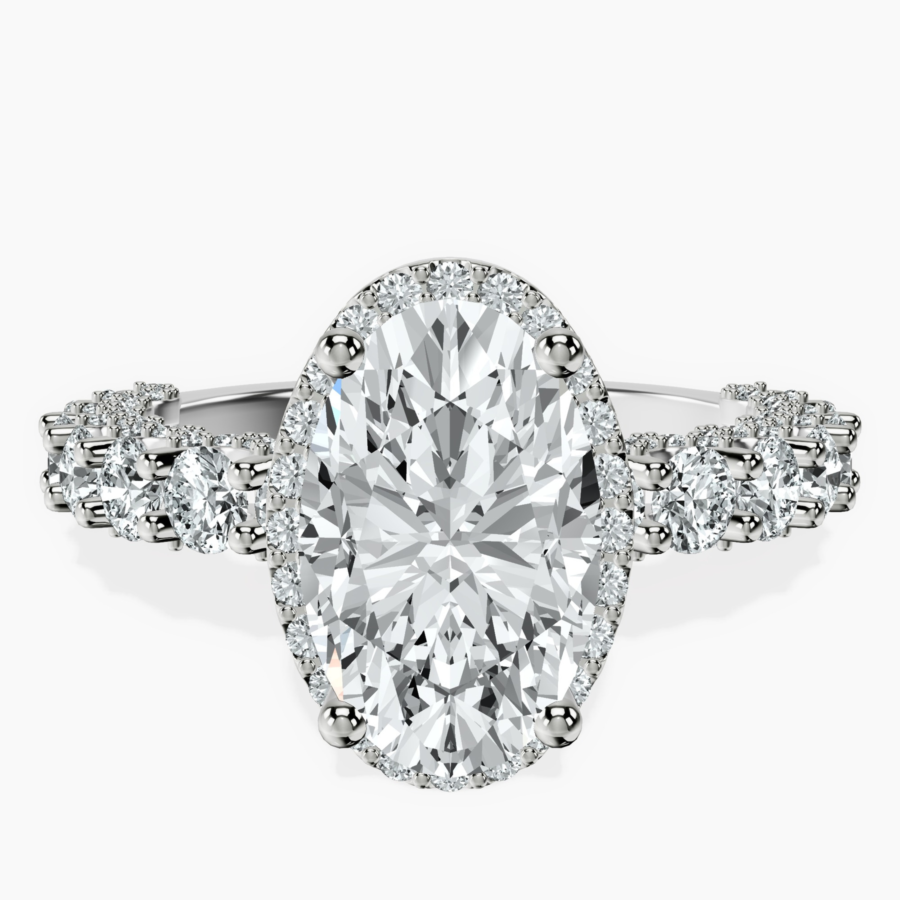 2.90 ct. oval Enchanté side stone halo ring in 18kt white gold rtr top