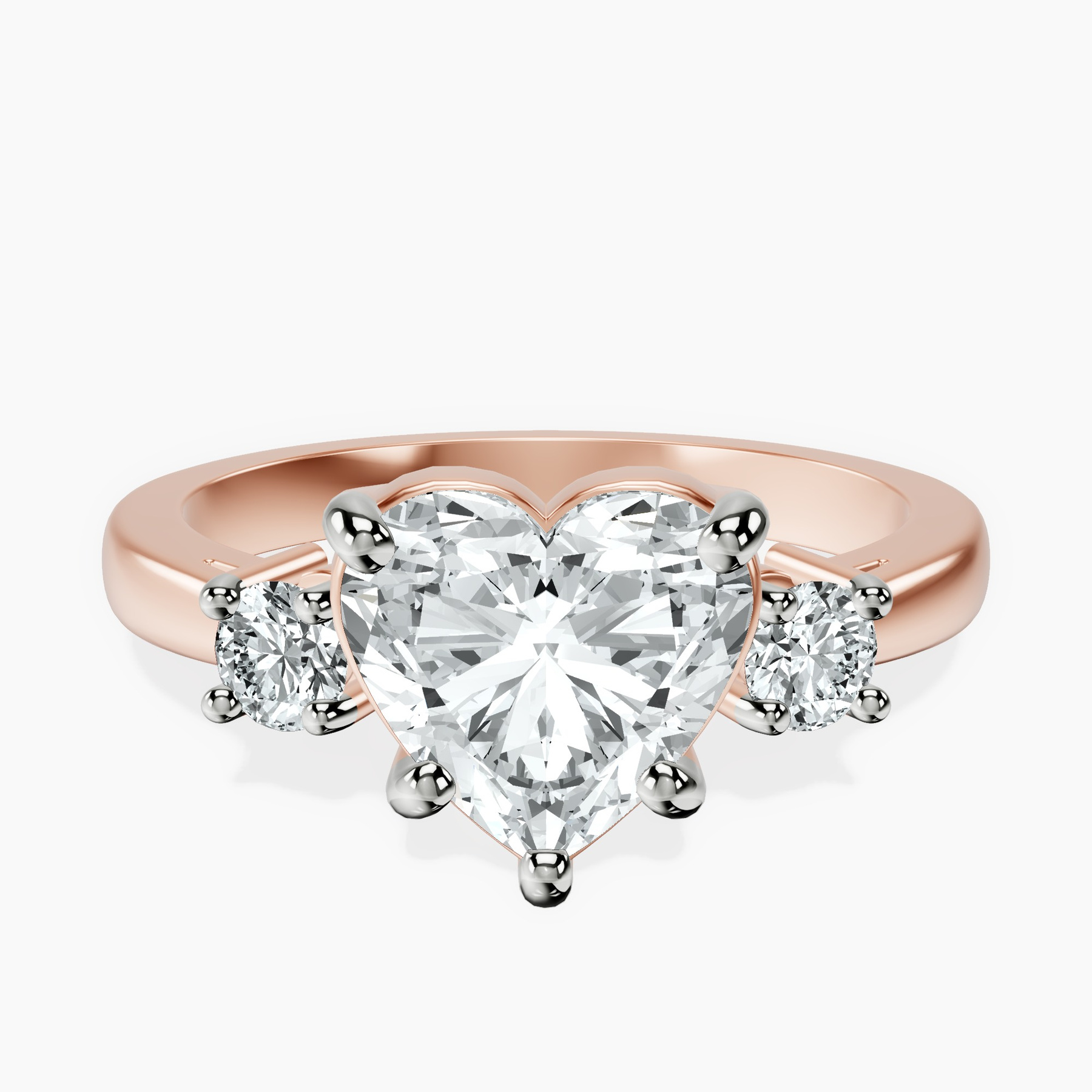 2.23 ct. heart Intricacy Three Stone Ring in 14kt rose gold rtr top