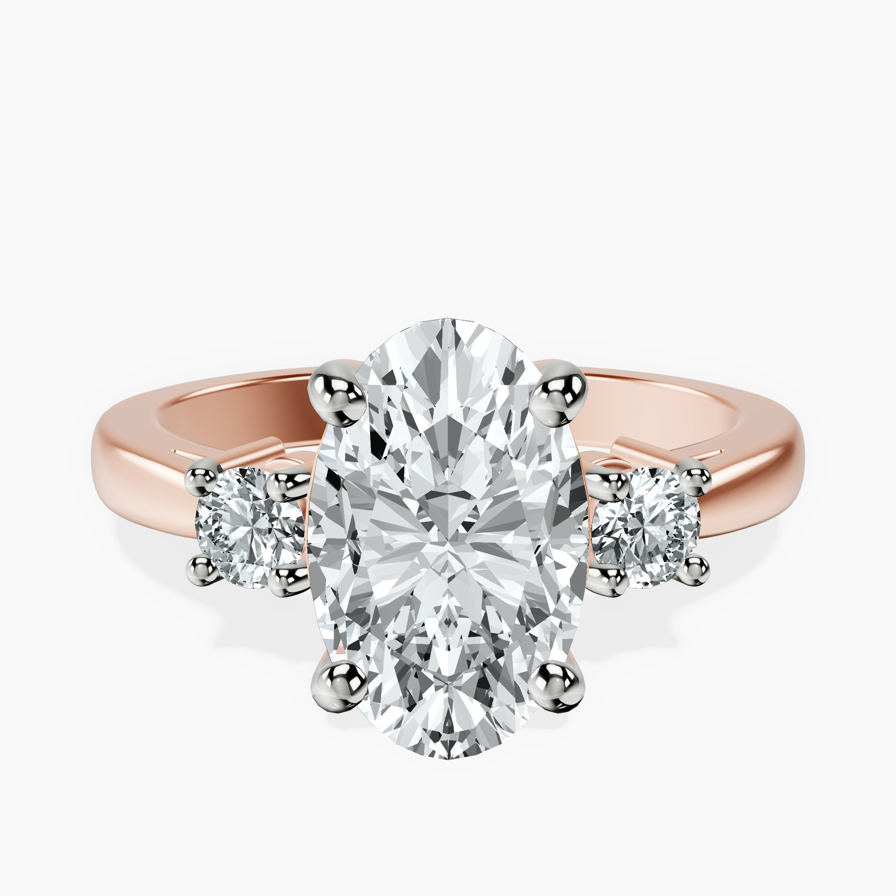 2.99 ct. oval Intricacy Three Stone Ring in 10kt rose gold rtr top
