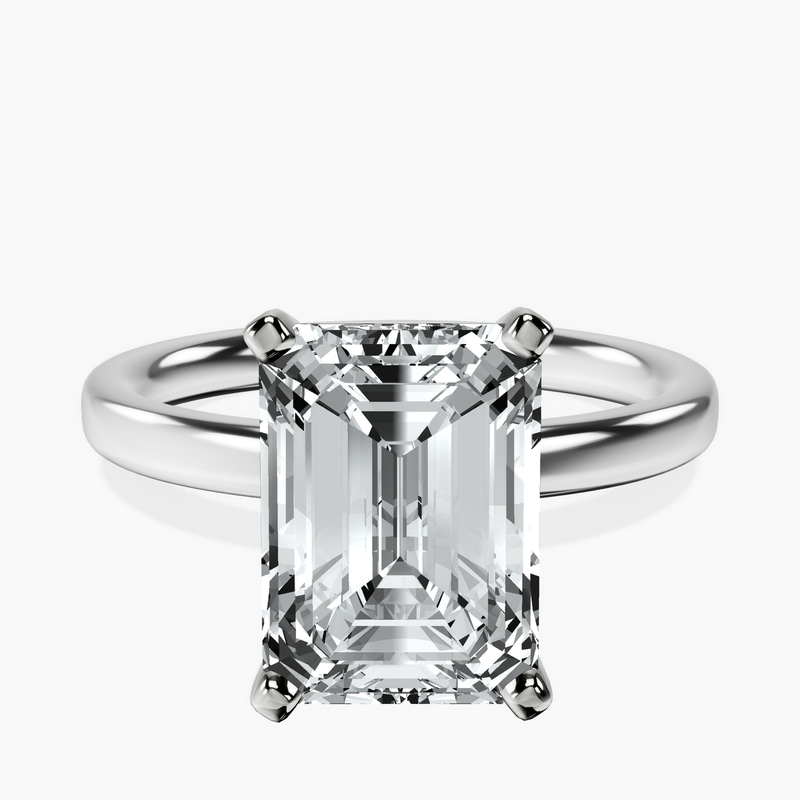 4.79 ct. emerald Four Prong Ring in platinum rtr top