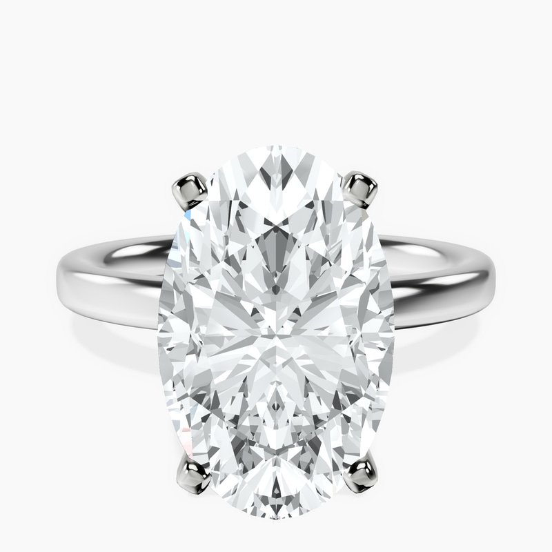 5.01 ct. oval Four Prong Ring in 10kt white gold rtr top