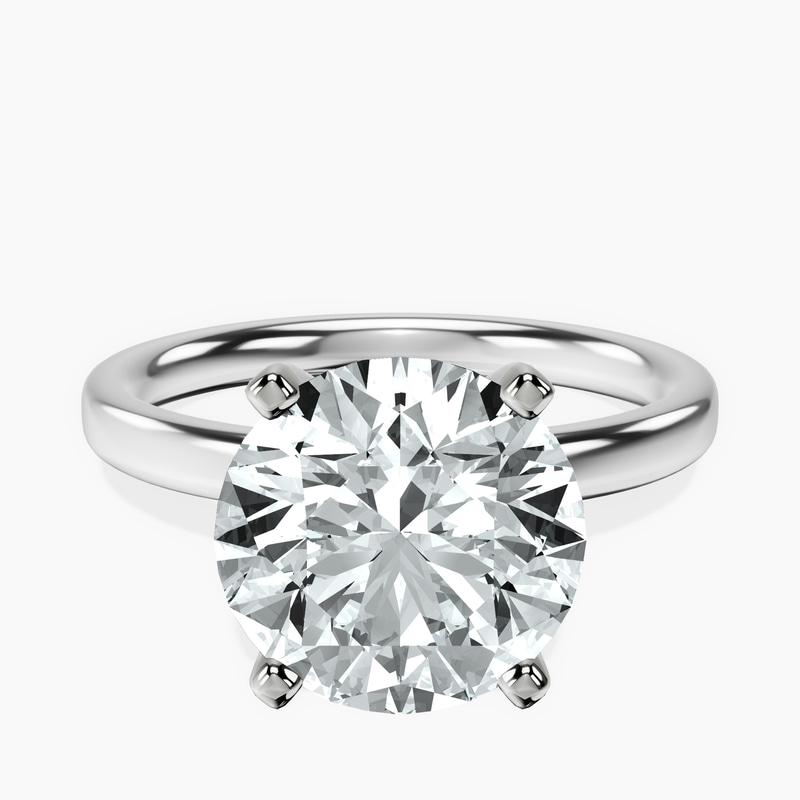 3.29 ct. round Four Prong Ring in 10kt white gold rtr top