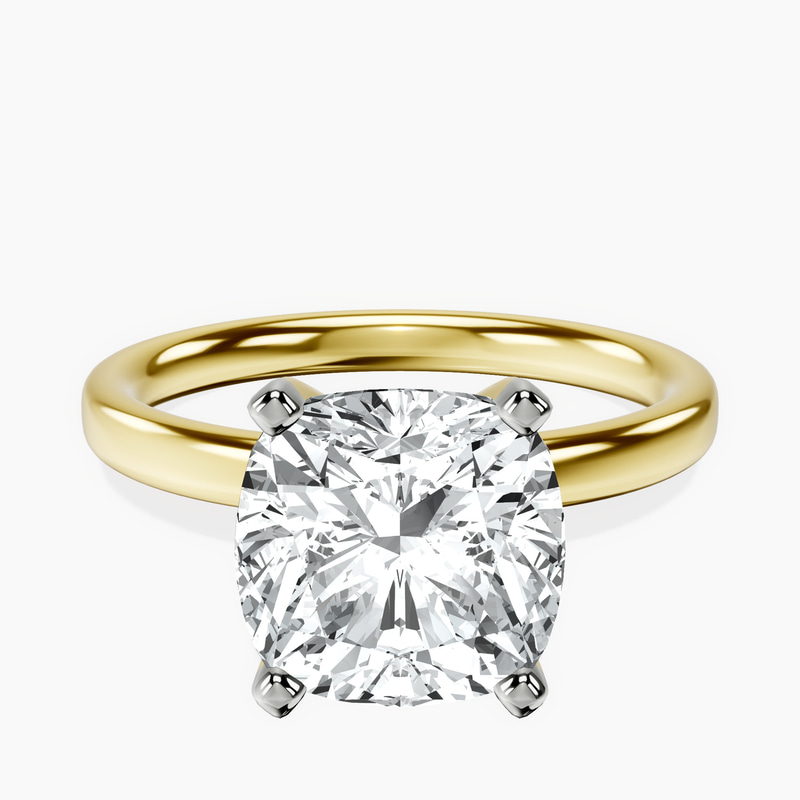 4.04 ct. cushion Four Prong Ring in 10kt yellow gold rtr top