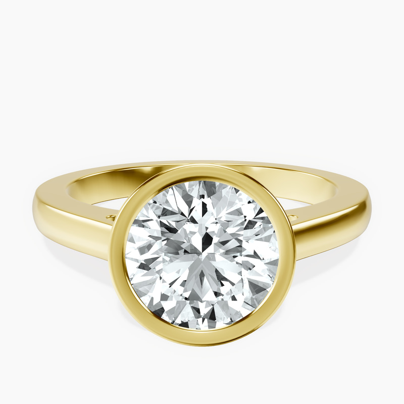 2.82 ct. round Bezel Solitaire Ring in 10kt yellow gold rtr top
