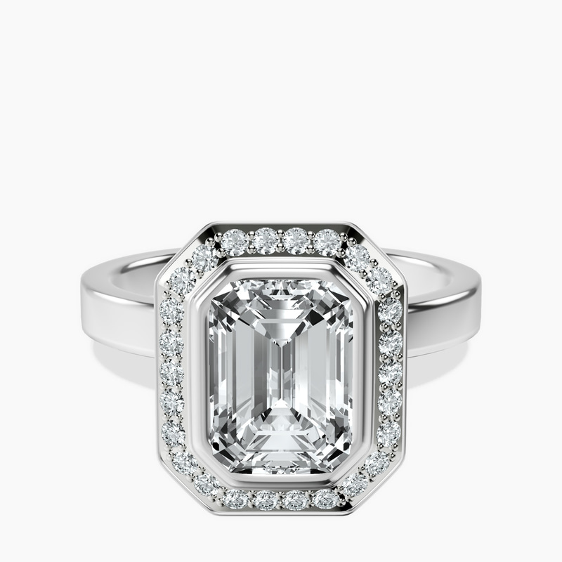 1.09 ct. emerald Upturned Dome Halo Ring in 10kt white gold rtr top
