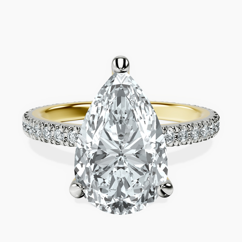 3.51 ct. pear Claire Eternity Ring in 10kt yellow gold rtr top