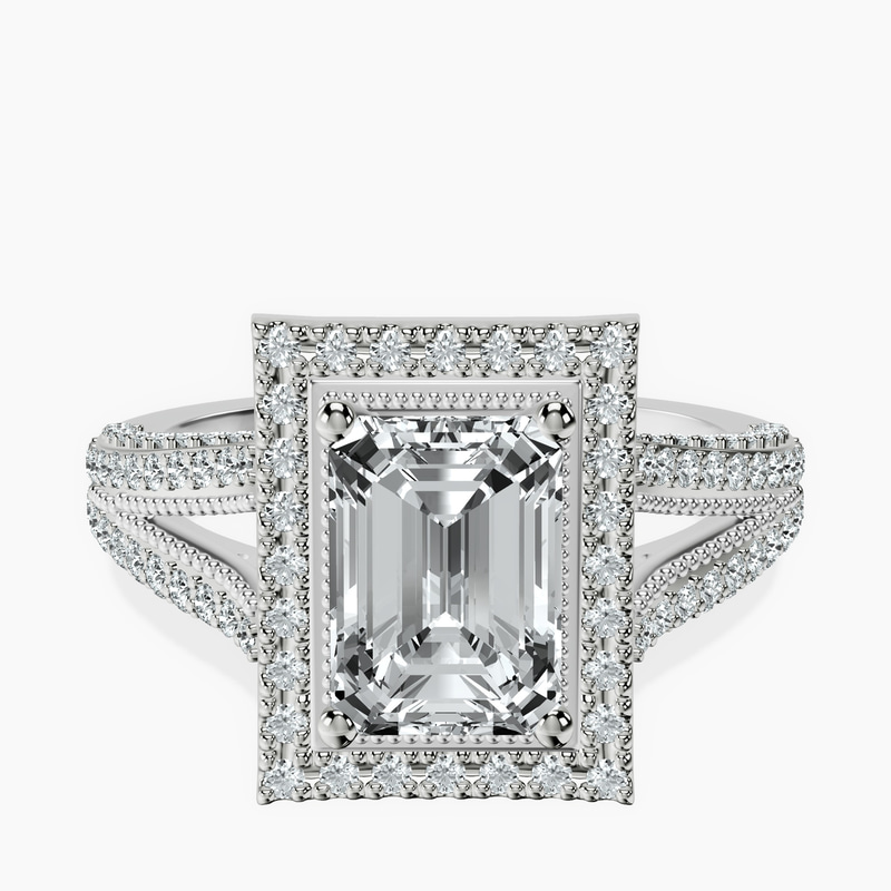 2.93 ct. emerald Opulenté halo ring in 10kt white gold rtr top