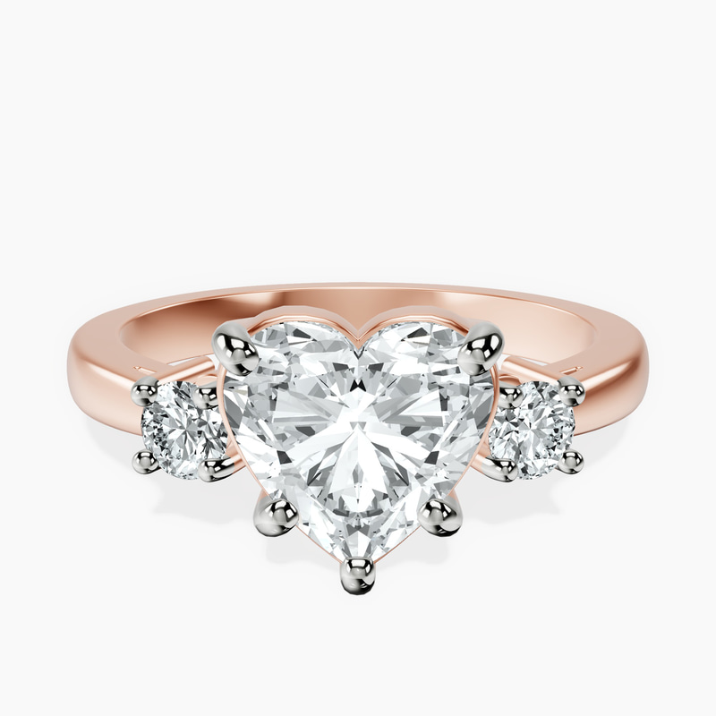 2.23 ct. heart Intricacy Three Stone Ring in 14kt rose gold rtr top