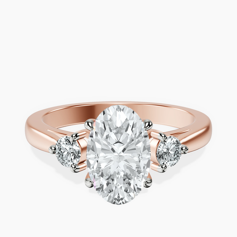 2.06 ct. oval Synthia Three Stone Ring in 14kt rose gold rtr top