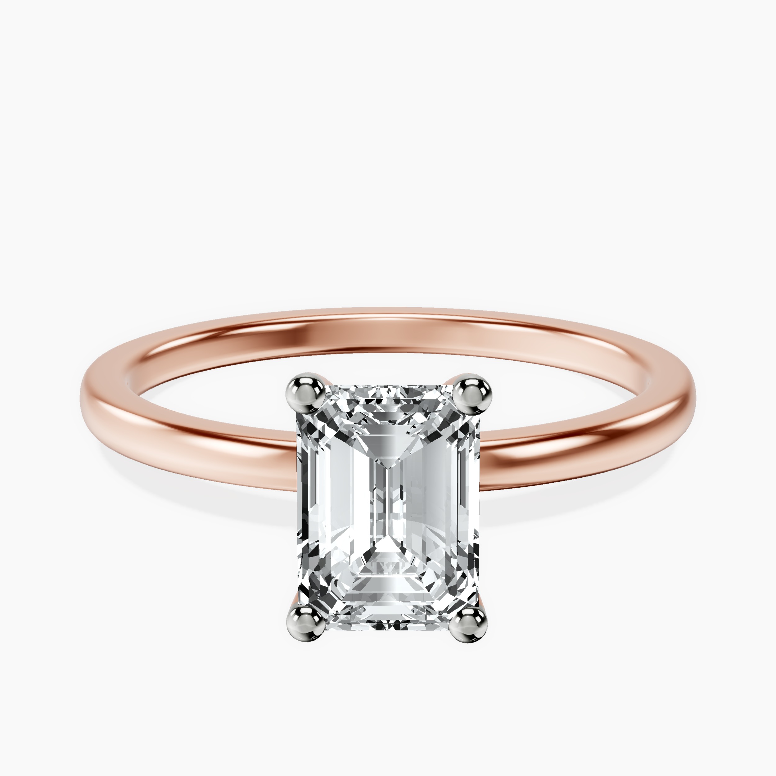 1.01 ct. emerald Four Prong Ring in 10kt rose gold rtr top
